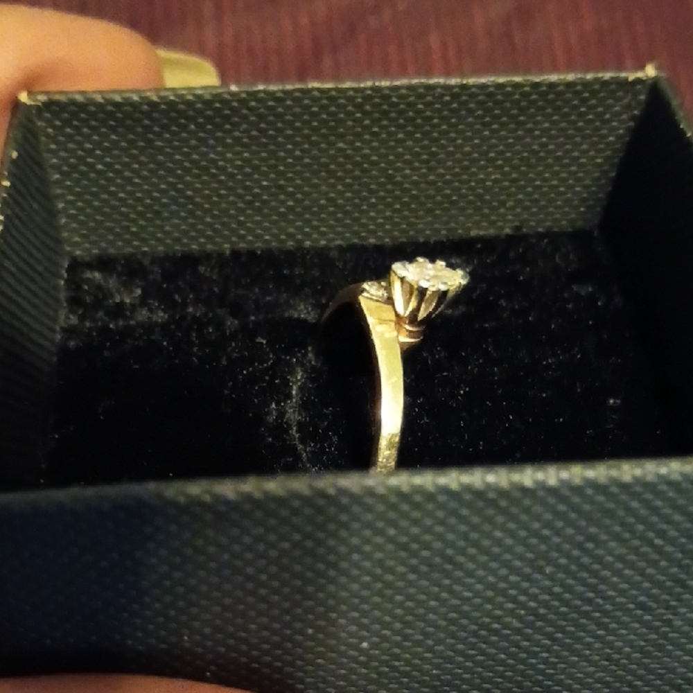 14K solid yellow gold marquise-cut diamond engagement ring.